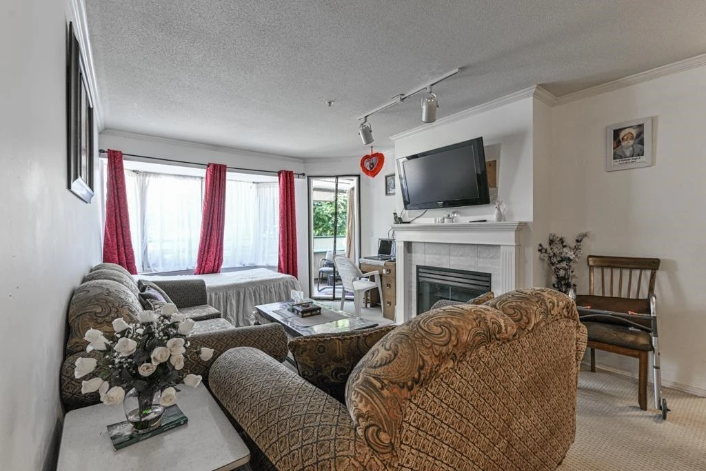 Living Room Photo of 208 2960 Trethewey Street, Abbotsford, BC
