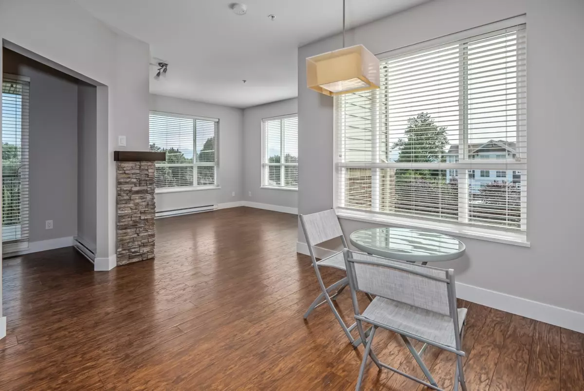 Living Room Photo of 303 3192 Gladwin Road, Abbotsford, BC