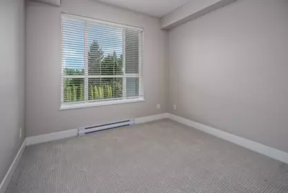 Garage Interior Photo of 303 3192 Gladwin Road, Abbotsford, BC