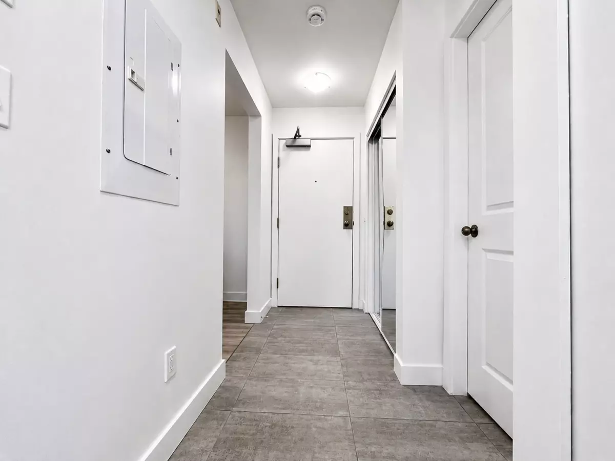 Family Room Photo of 434 10838 City Parkway, Surrey, BC