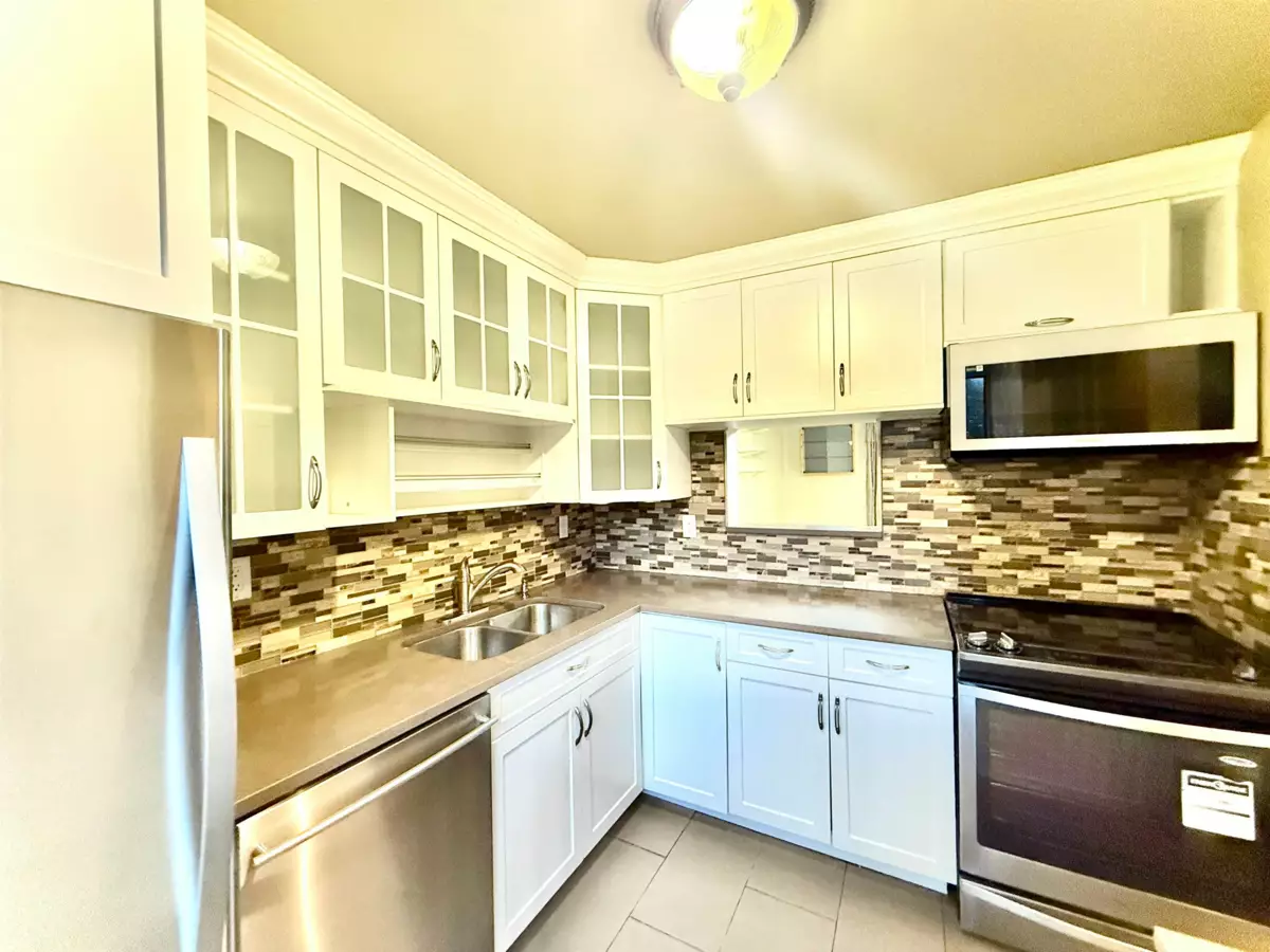 Living Room Photo of 111 2915 Norman Avenue, Coquitlam, BC