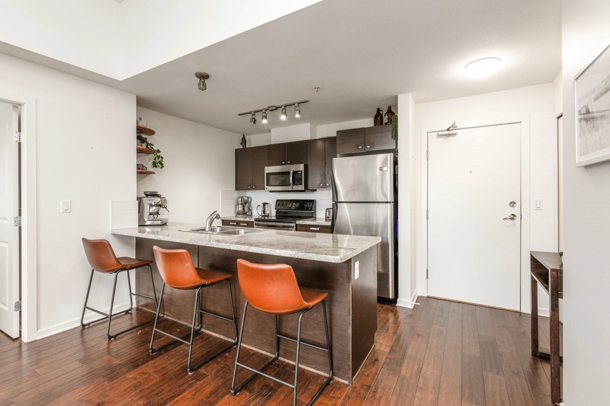 Living Room Photo of 401 18755 68 Avenue, Surrey, BC