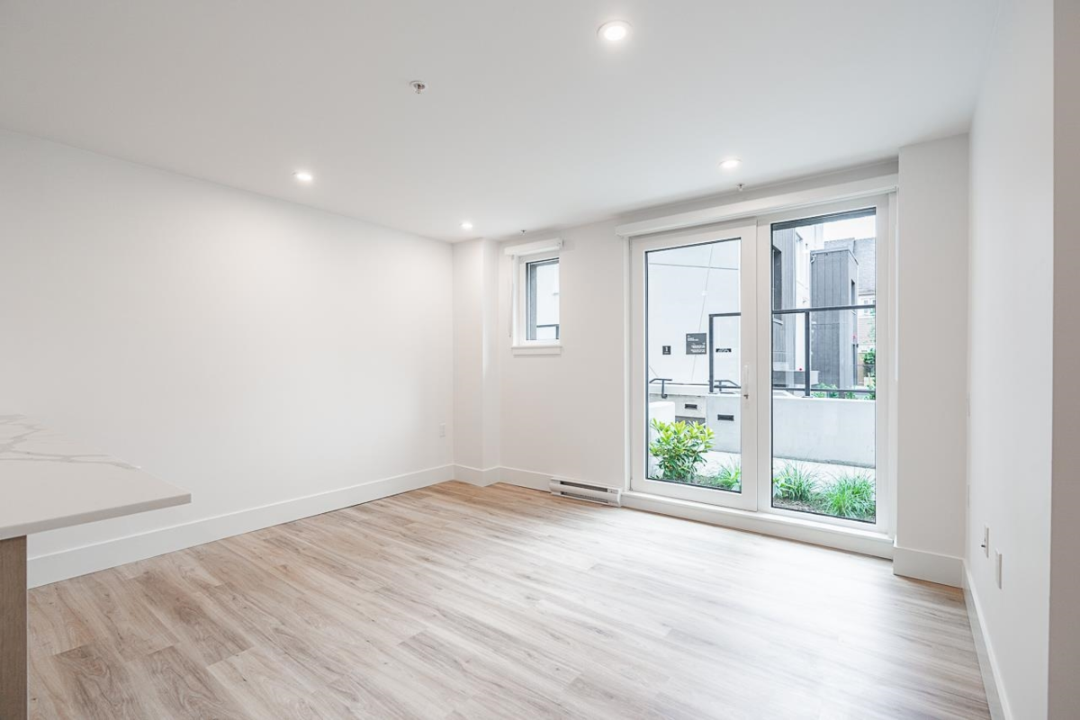 Living Room Photo of 109 2085 E 1st Avenue, Vancouver, BC