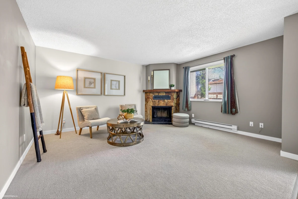Living Room Photo of 101 7120 133 Street, Surrey, BC