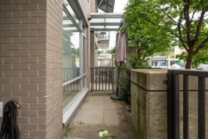 Basement Recreation Room Photo of 104 1591 Bowser Avenue, North Vancouver, BC