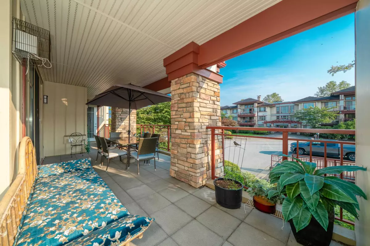 Family Room Photo of 201 16477 64 Avenue, Surrey, BC