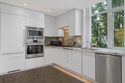 Family Room Photo of 211 185 Victory Ship Way, North Vancouver, BC