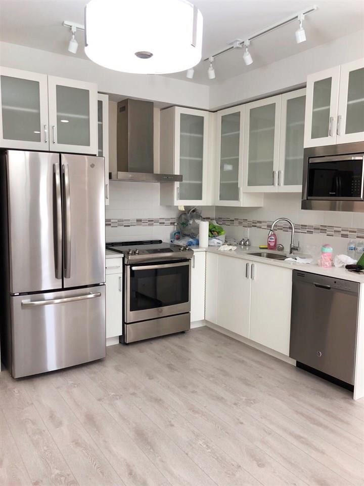 Family Room Photo of 203 4882 Slocan Street, Vancouver, BC