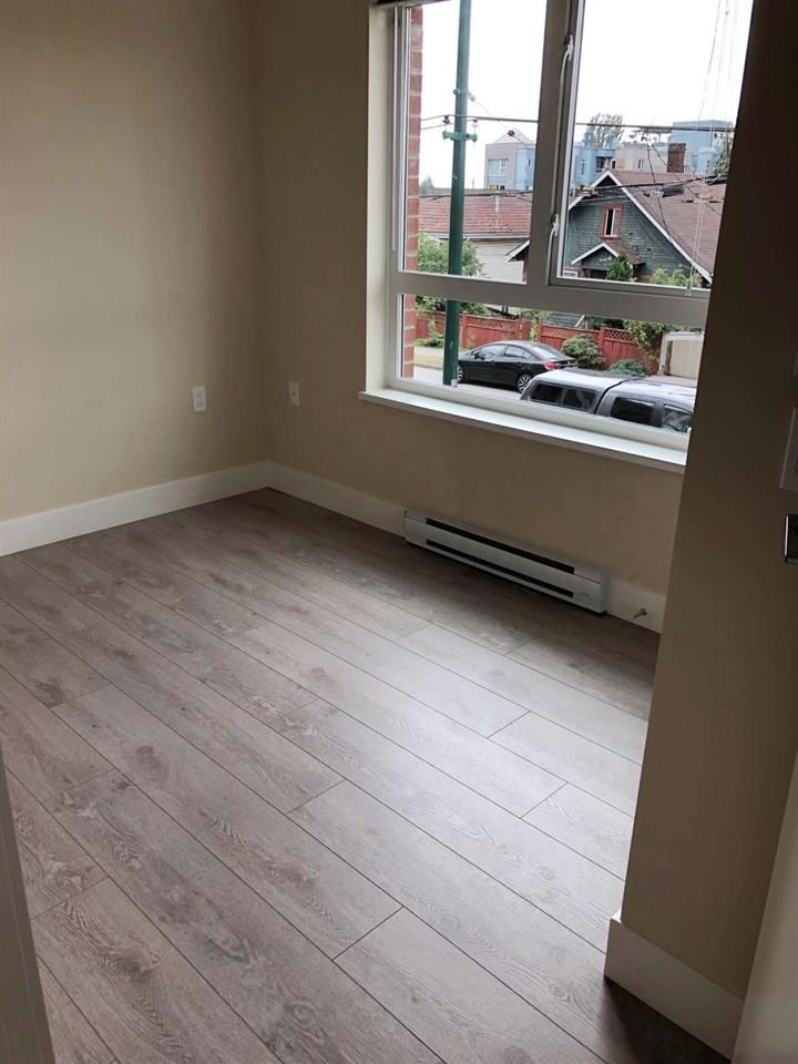 Kitchen Island Photo of 203 4882 Slocan Street, Vancouver, BC