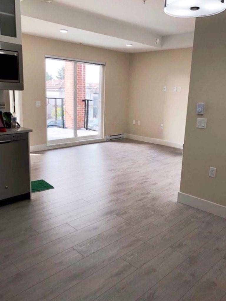 Living Room Photo of 203 4882 Slocan Street, Vancouver, BC