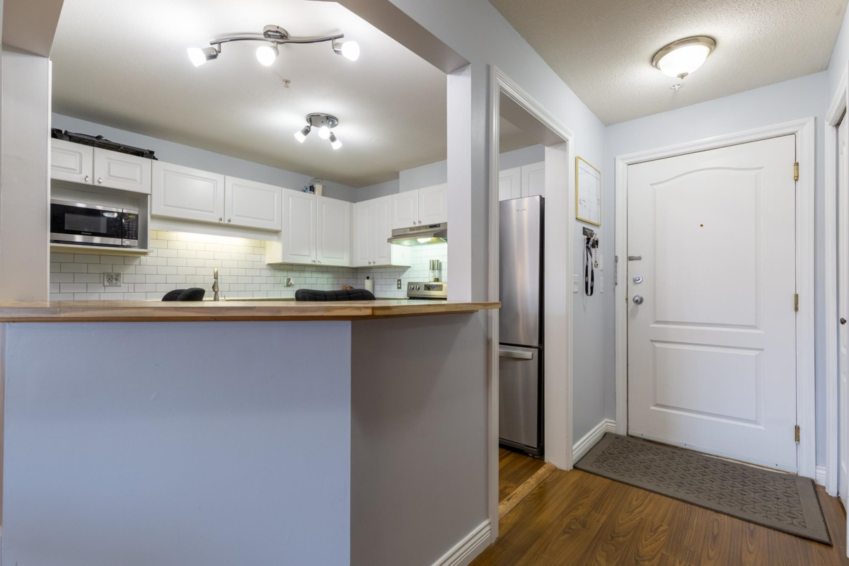 Living Room Photo of 201 5765 Glover Road, Langley, BC