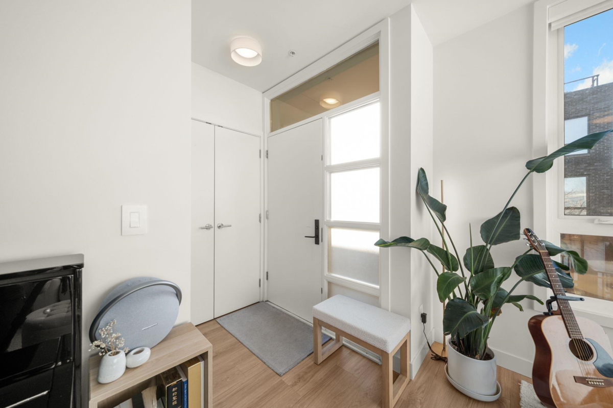 Living Room Photo of 312 6085 Irmin Street, Burnaby, BC