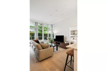 Basement Recreation Room Photo of 112 185 Victory Ship Way, North Vancouver, BC