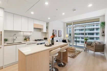 Living Room Photo of 411 13573 98a Avenue, Surrey, BC