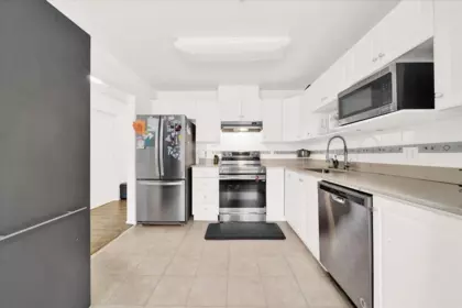 Kitchen Island Photo of 103 12733 72 Avenue, Surrey, BC