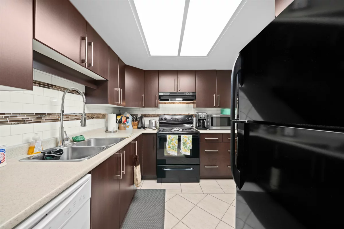 Living Room Photo of 416 2915 Glen Drive, Coquitlam, BC