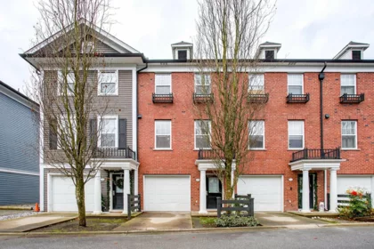 Front exterior of 19 19572 Fraser Way, Pitt Meadows, BC