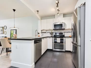 Family Room Photo of 204 7428 Byrnepark, Burnaby, BC