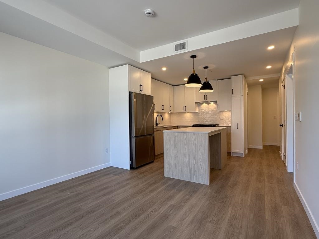 Kitchen Island Photo of 204 27218 Aldergrove Town Centre Drive, Langley, BC