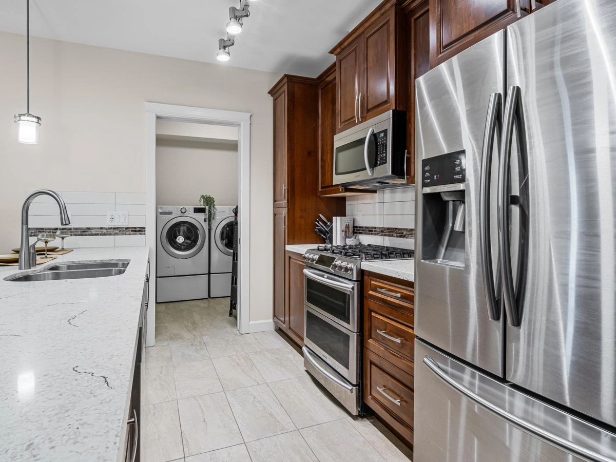 Living Room Photo of A113 20716 Willoughby Town Centre Drive, Langley, BC