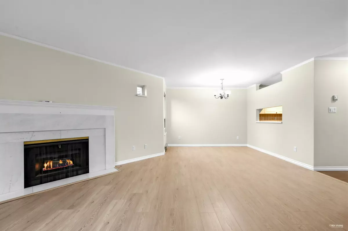 Living Room Photo of 107 7455 Moffatt Road, Richmond, BC