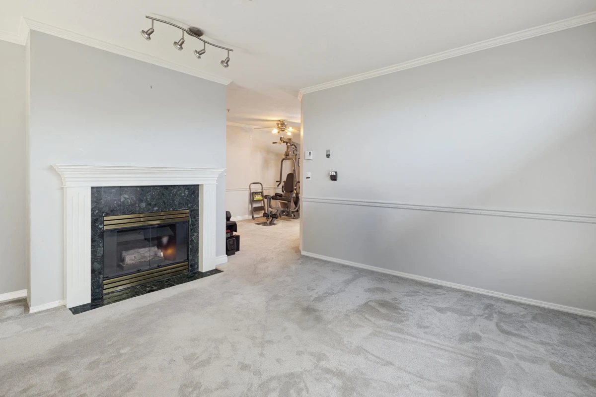 Living Room Photo of 305 5977 177b Street, Surrey, BC