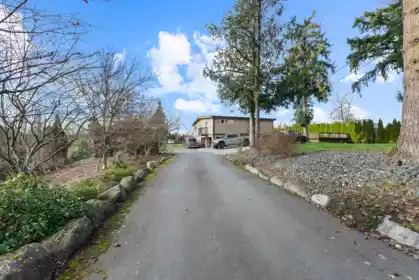 Front exterior of 9729 216 Street, Langley, BC