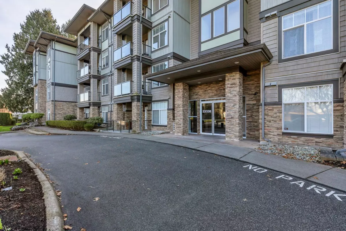 Living Room Photo of 105 33338 Mayfair Avenue, Abbotsford, BC