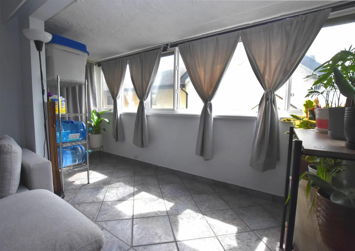 Family Room Photo of 201 1320 Fir Street, White Rock, BC