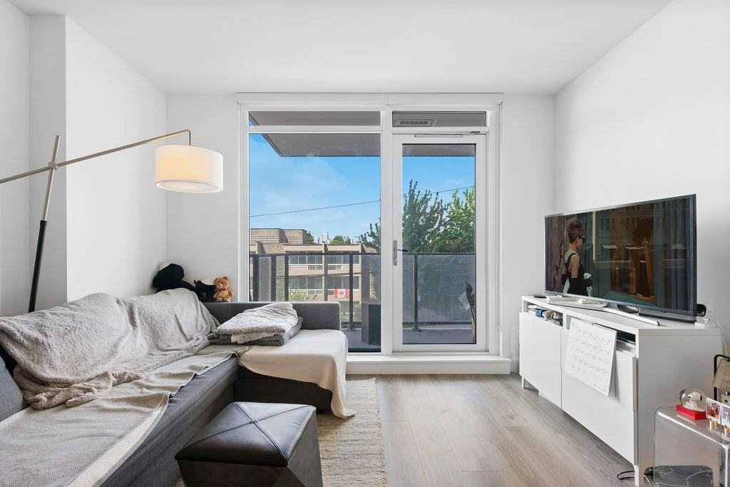 Living Room Photo of 205 8188 Fraser Street, Vancouver, BC
