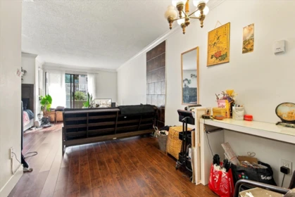 Living Room Photo of 107 830 E 7th Avenue, Vancouver, BC