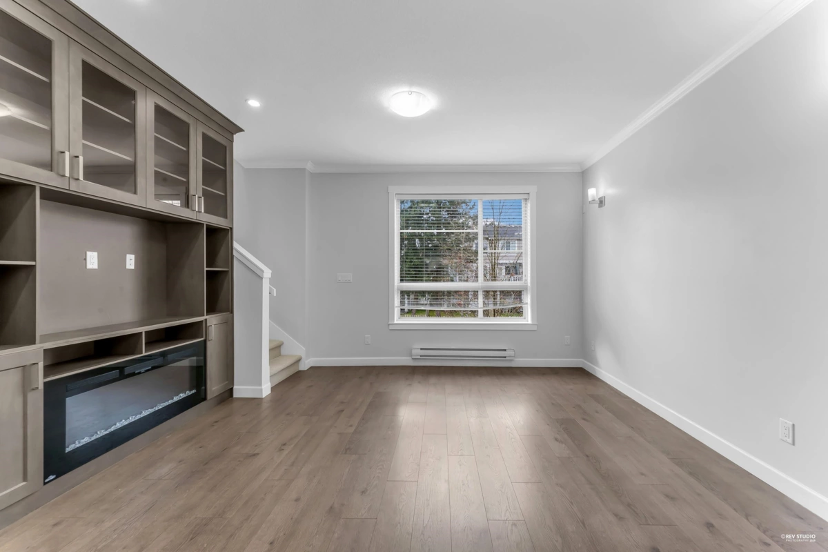 Living Room Photo of 10 16127 87 Avenue, Surrey, BC