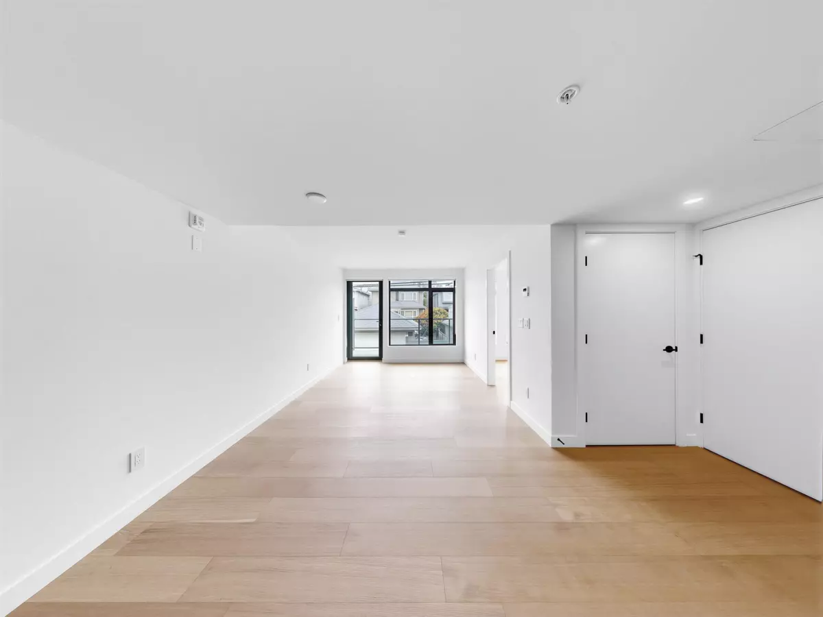 Exterior Rear Photo of 202 6485 Manitoba Street, Vancouver, BC