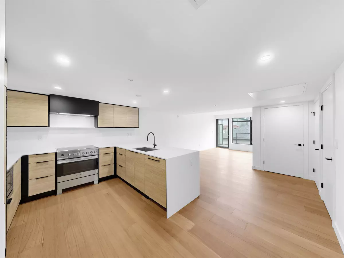 Family Room Photo of 202 6485 Manitoba Street, Vancouver, BC