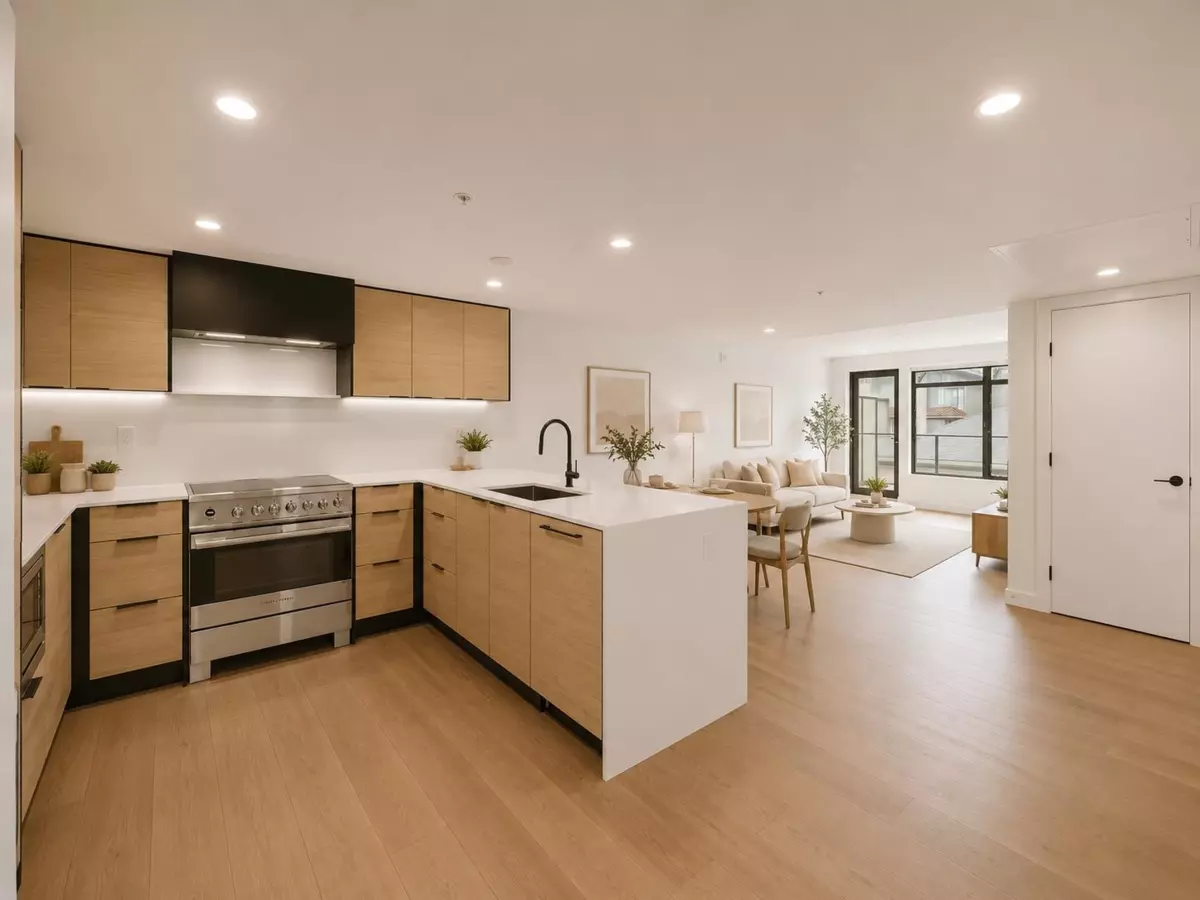 Living Room Photo of 202 6485 Manitoba Street, Vancouver, BC