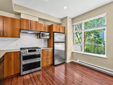Family Room Photo of 122 9229 University Crescent, Burnaby, BC