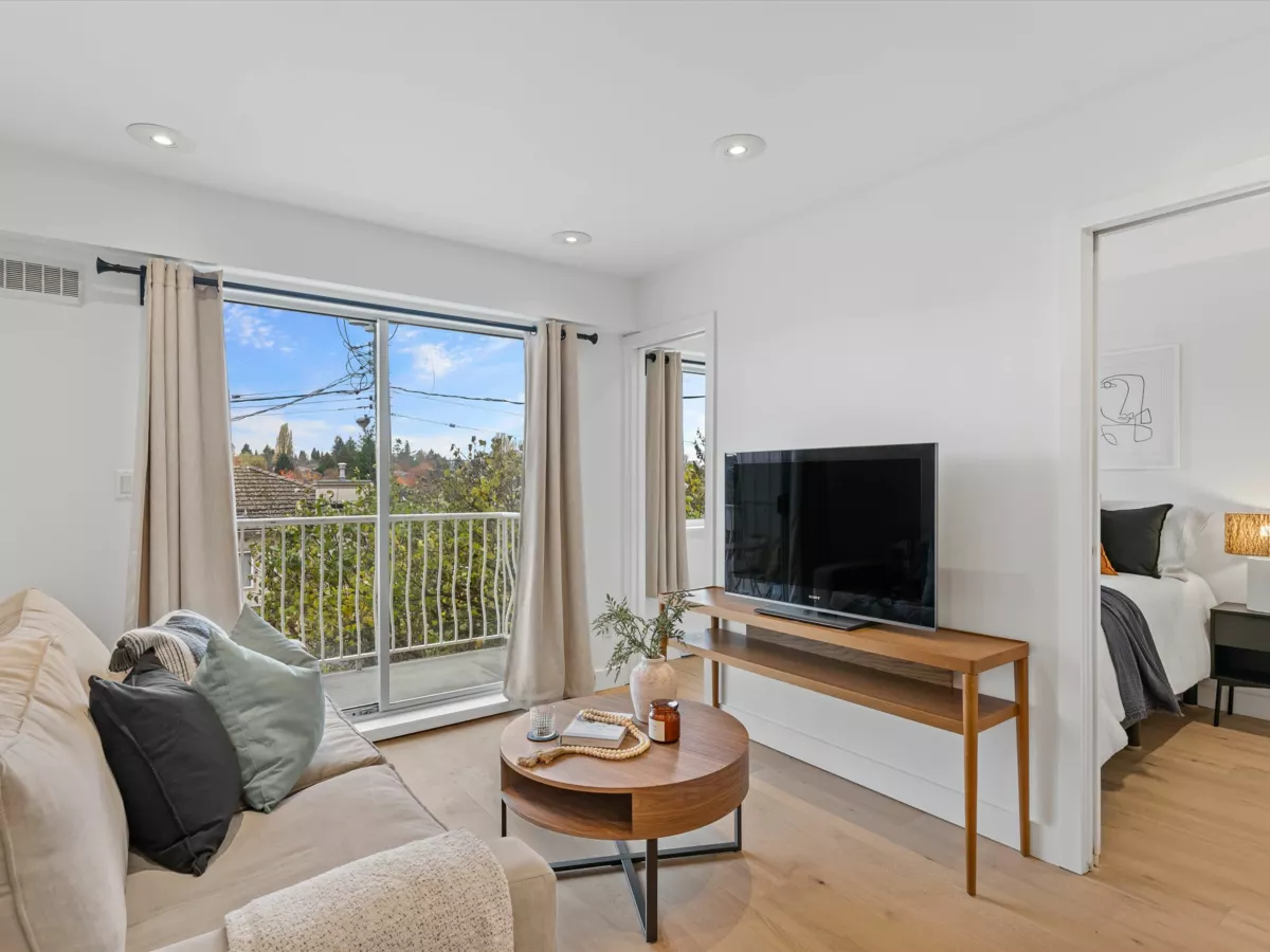 Family Room Photo of 201 4315 Fraser Street, Vancouver, BC