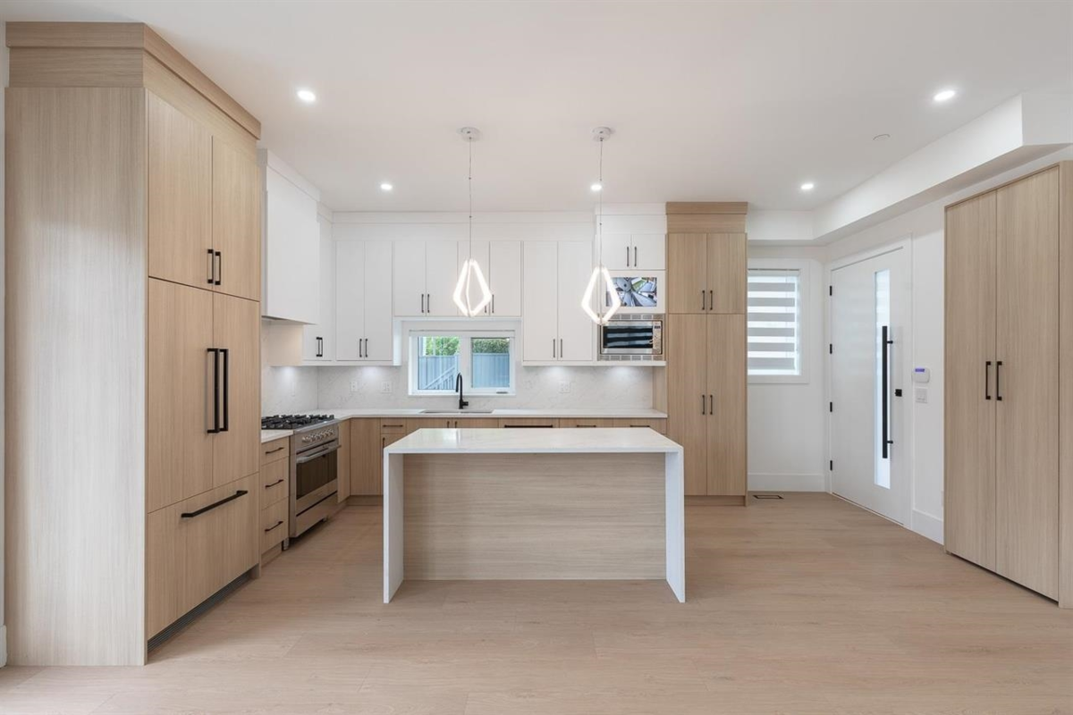 Living Room Photo of 2 6964 Inverness Street, Vancouver, BC