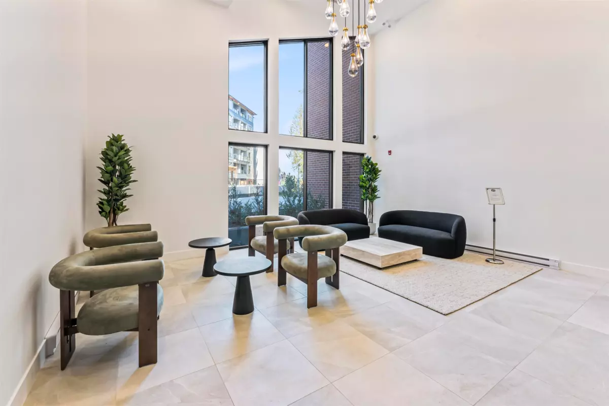 Living Room Photo of 611 3480 146a Street, Surrey, BC