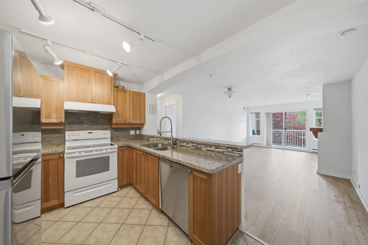 Living Room Photo of 212 1428 Parkway Boulevard, Coquitlam, BC