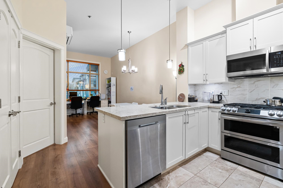 Living Room Photo of 612 8561 203a Street, Langley, BC