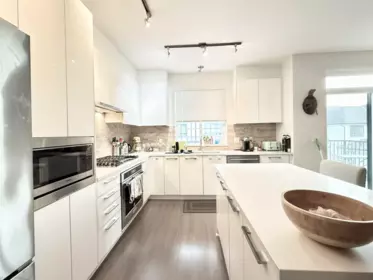 Kitchen Island Photo of 18 3500 Burke Village Promenade, Vancouver, BC