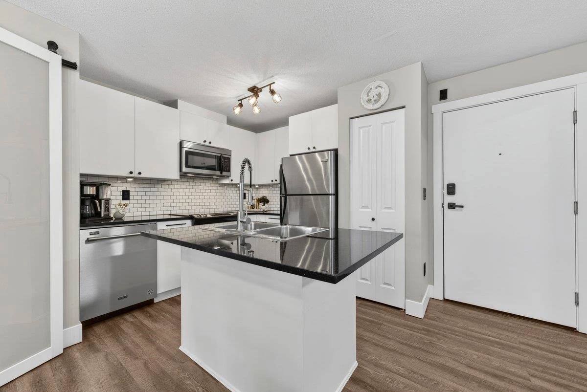 Living Room Photo of 301 6500 194 Street, Surrey, BC