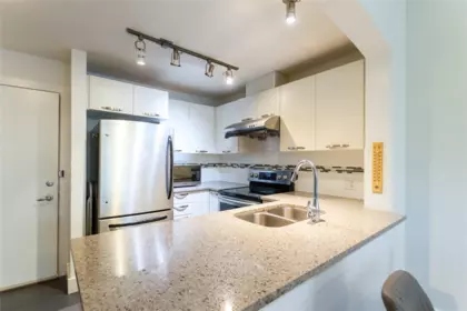 Kitchen Island Photo of 106 7428 Byrnepark Walk, Burnaby, BC