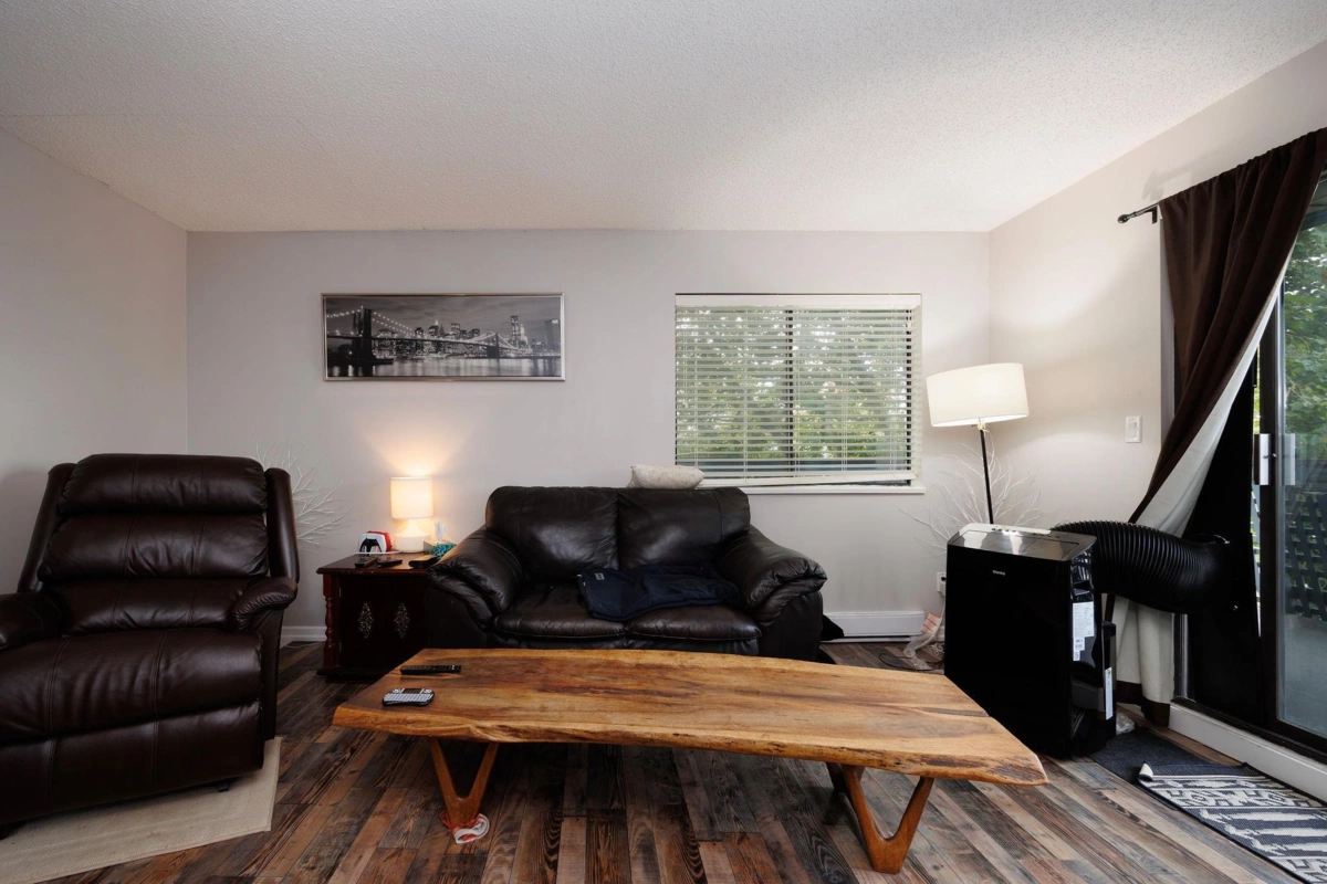 Family Room Photo of 207 17661 58a Avenue, Surrey, BC