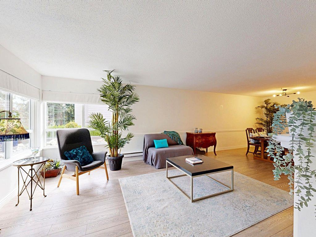 Family Room Photo of 106 1467 Martin Street, White Rock, BC