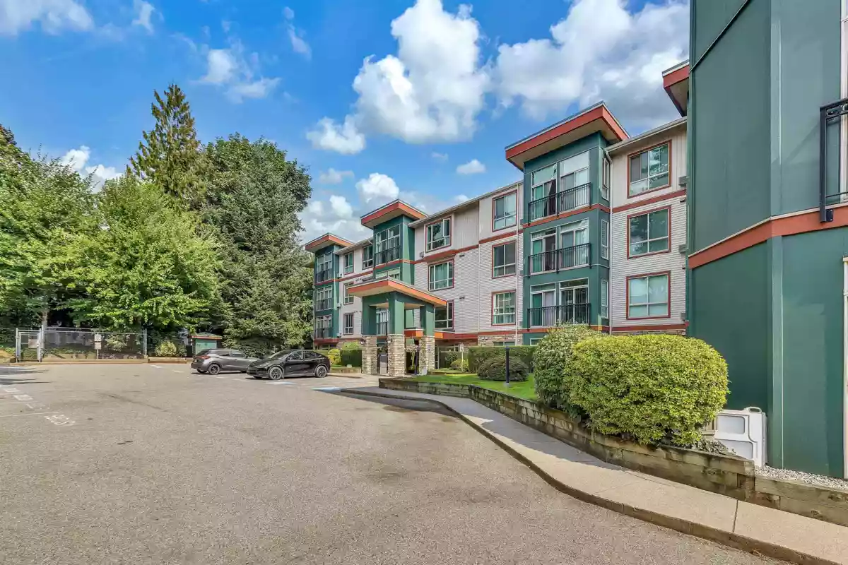 Living Room Photo of 312 33485 South Fraser Way, Abbotsford, BC