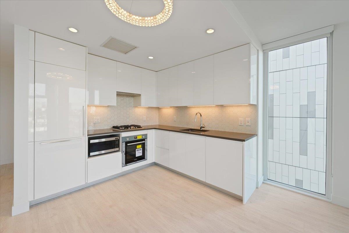 Kitchen Photo of 410 8138 Fraser Street, Vancouver, BC