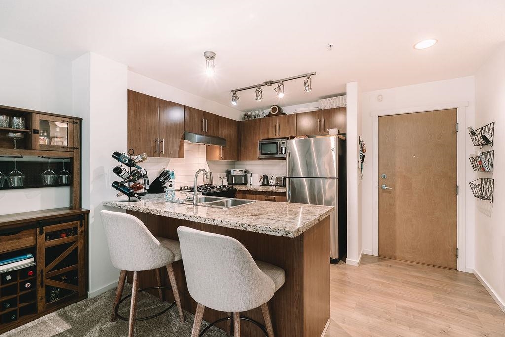 Family Room Photo of 113 600 Klahanie Drive, Port Moody, BC