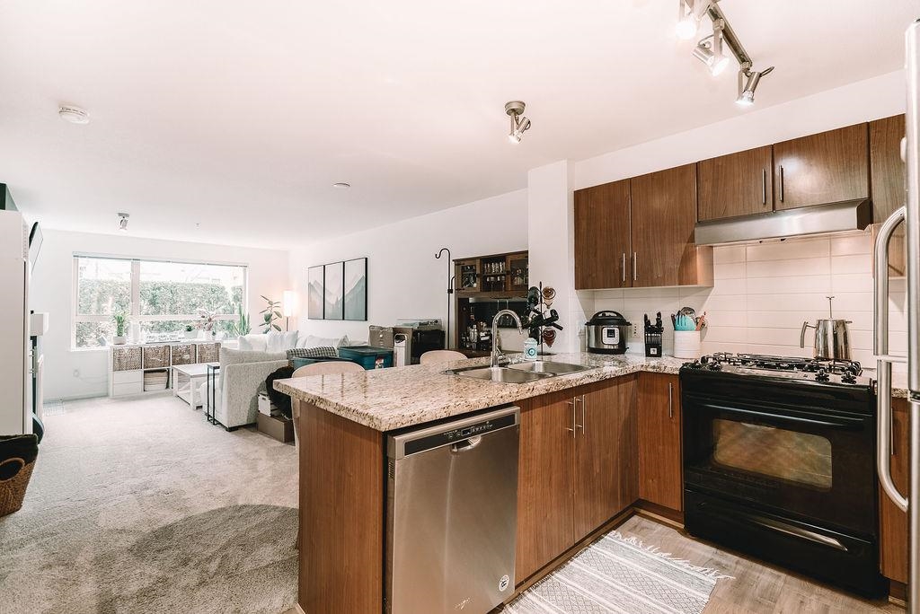 Living Room Photo of 113 600 Klahanie Drive, Port Moody, BC